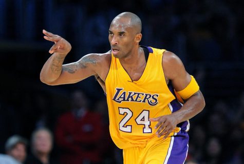 The Los Angeles Lakers' Kobe Bryant celebrates his 3-pointer against the Minnesota Timberwolves in the second quarter at Staples Center in Los Angeles on Wednesday, Oct. 28, 2015.