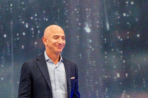 Jeff Bezos, head of Amazon, can be seen on the fringes of the companys novelties event on Sept. 25, 2019. Bezos recently pledged $10 billion toward climate change, a good example of how the rich can help the environment.