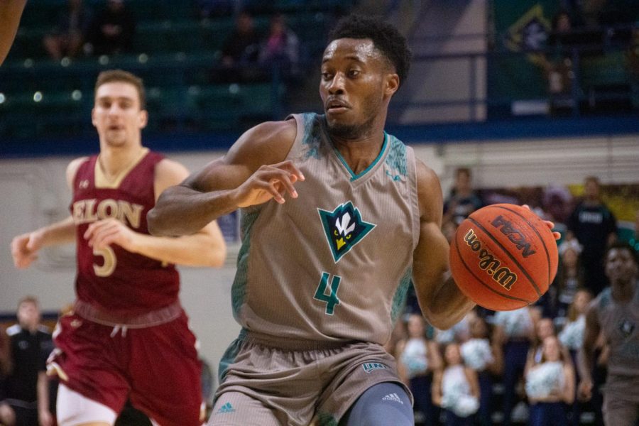 Mike Okauru (4) during UNCWs matchup with Elon on Feb. 6, 2020 at Trask Coliseum.