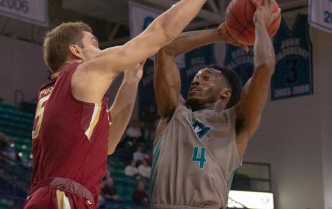 Mike Okauru (4) during UNCW's matchup with Elon on Feb. 6, 2020 at Trask Coliseum.