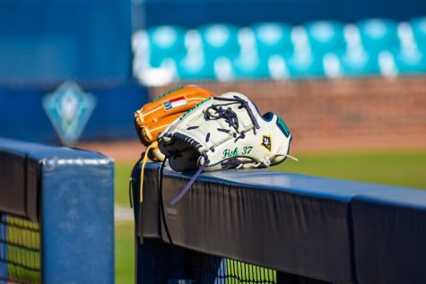 A pair of UNCW gloves during the Seahawks' matchup with Marshall on Feb. 22, 2020 at Brooks Field.