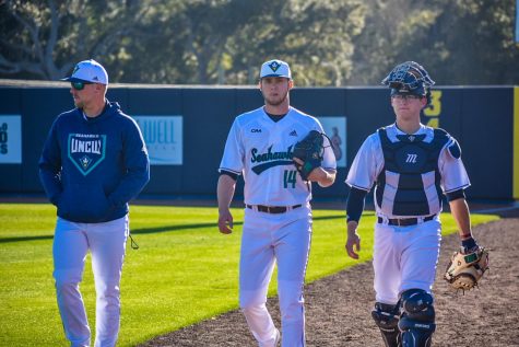 Landen Roupp (14) before UNCW's matchup with Bryant on Feb. 15, 2020