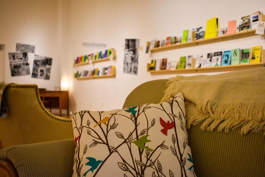 The Zine Gallery opened February 27 in the Cultural Arts Building main gallery area, featuring comfy couches to encourage visitors to engage with the exhibits. Photo by Zachary Kilby. 
