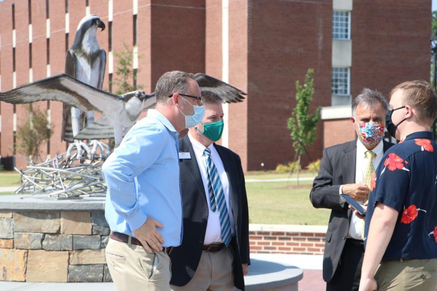 BLAH and UNCW Chancellor Jose V. Sartarelli in front of the new sculpture. 