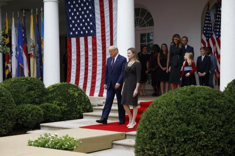 Judge Amy Coney Barrett walks from the Oval Office to be introduced by President Donald Trump as his Supreme Court Associate Justice nominee in the Rose Garden of the White House in Washington, D.C., on Saturday, Sept. 26, 2020. (Yuri Gripas/Abaca Press/TNS)