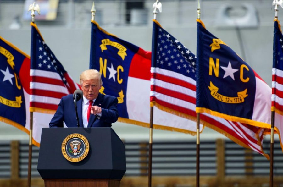 President Donald Trump speaks to a small crowd outside the USS North Carolina on Sept. 2, 2020 in Wilmington, North Carolina. President Donald Trump visited the port city for a brief ceremony designating Wilmington as the nations first WWII Heritage City. The title is in honor of the areas efforts during WWII.(Photo by Melissa Sue Gerrits/Getty Images/TNS)