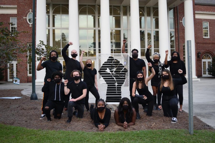 From left to right, back to front: Kahlil Allen, Davis Wood, Brenna Flanagan, John McCall, Addison Hamlet, Ashley Jackson, Breonté Scarboro, Tanner Whicker, Ashley Flowers, Ariel Montoya, Cierra Peterkin, Dajah Glenn.