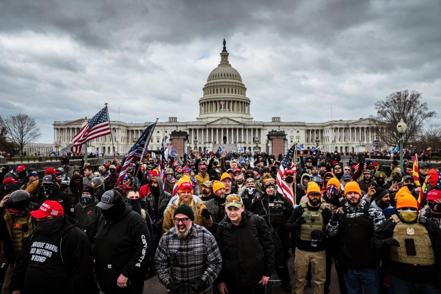 WASHINGTON, DC - JANUARY 06: Pro-Trump protesters gather in front of the U.S. Capitol Building on January 6, 2021 in Washington, DC. A pro-Trump mob stormed the Capitol, breaking windows and clashing with police officers. Trump supporters gathered in the nations capital today to protest the ratification of President-elect Joe Bidens Electoral College victory over President Trump in the 2020 election.