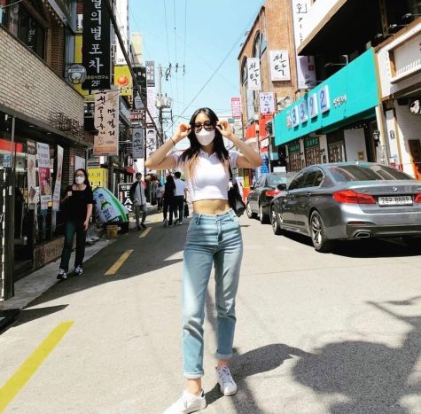 Daomi poses on the streets of South Korea.