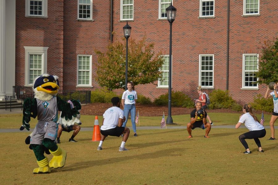 Sammy Seahawk cheers on participants at the Inaugural Veterans Week Fitness Expo.