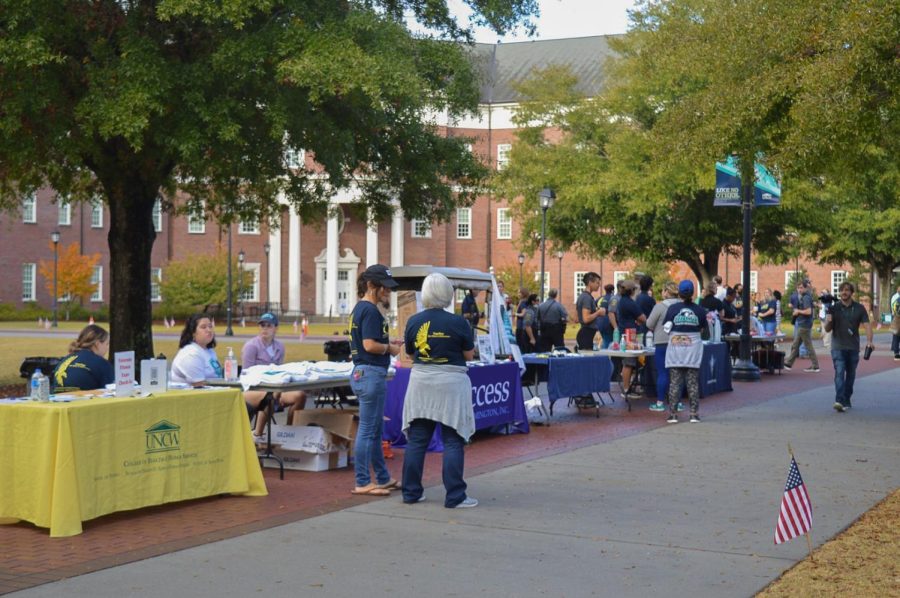 Several tables were set up on Chancellors Walk for the Inaugural Veterans Week Fitness Expo.