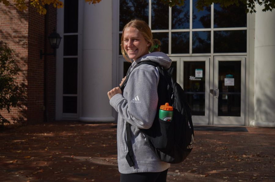 Audrey Harding carries an extra bag for her soccer items. 
