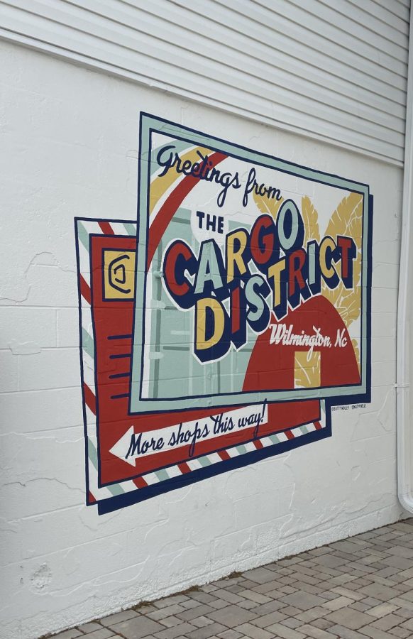 The Cargo District is a neighborhood in urban Wilmington that has small stores and markets in cargo container sized storefronts. 