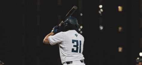 Aidan Smith during his first career at-bat in UNCWs matchup with VMI on Apr. 1, 2022 at Brooks Field.