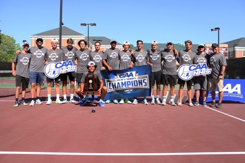 UNCW mens tennis team after winning the 2022 CAA Mens Tennis Championship.
