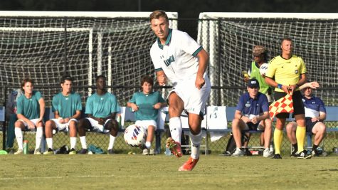 Josef Hefele connects on a pass against Old Dominion. Photo by Joe Browning.