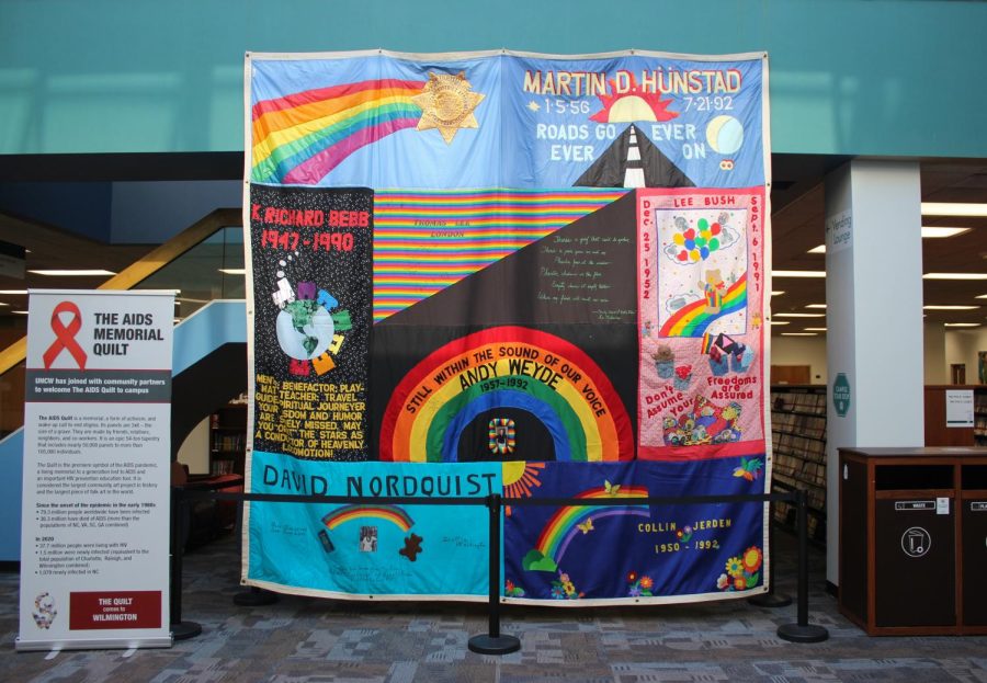 The AIDS Memorial Quilt on display at Randall Library, a 54-ton tapestry that features almost 50,000 panels and the names of 105,000 people.