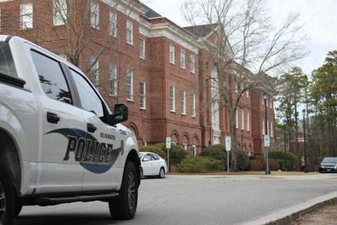 UNCW Police outside of the Watson College of Education on Feb. 20. Multiple officers responded to an inaccurate report of gunfire on campus caused by a loud sound that emanated from the construction site near Randall Library.