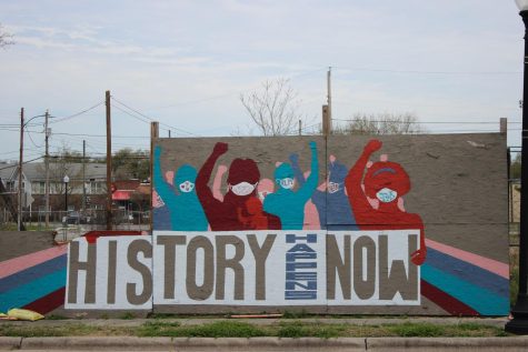 History Happens Now, a mural across the street from the 1898 Memorial. The piece was created in 2020 amid nationwide Black Lives Matter protests by DREAMS, a local art education and youth development organization.