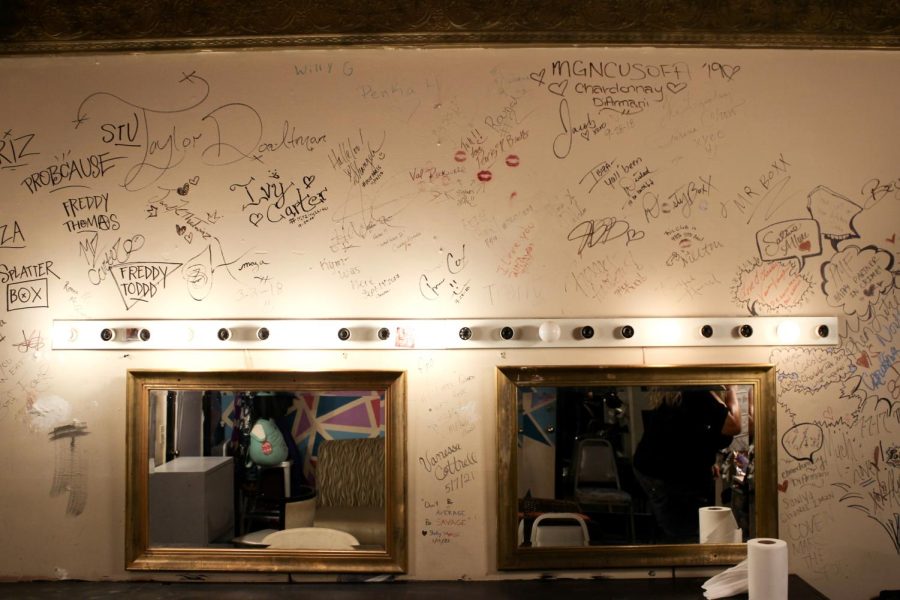 Inside the dressing room on the third floor of Ibiza. The room is where featured drag performers get ready for upcoming shows. On the walls are the signatures of past drag performers.