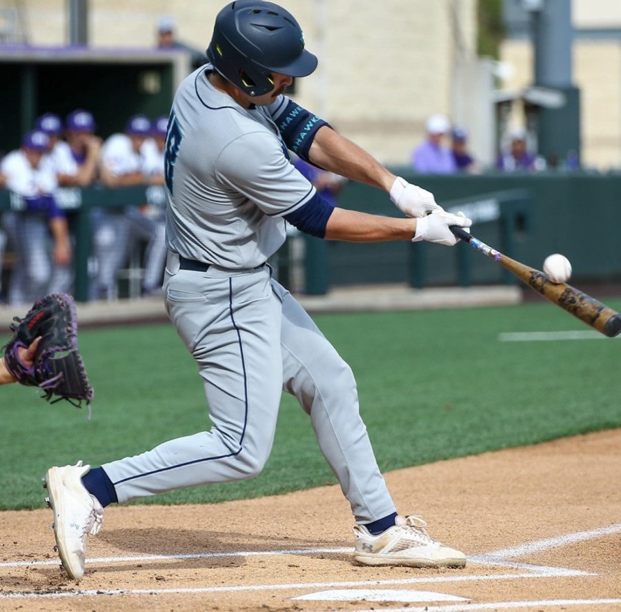 Dillon Lifrieri connects with a pitch at TCU this weekend. Photo by Jay Hinton.