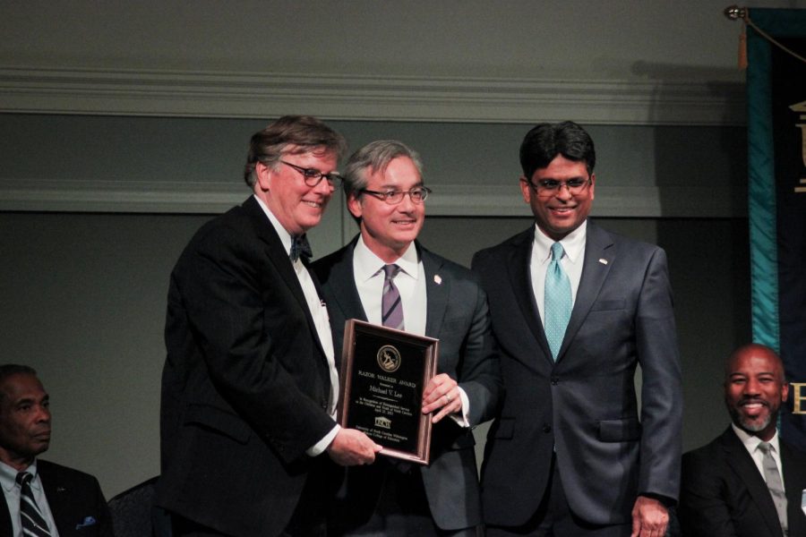 From left, Dean of Watson Van Dempsey, NC Sen. Michael Lee and UNCW Chancellor Aswani Volety present Sen. Lee with the Razor Walker Award for Public Policy.