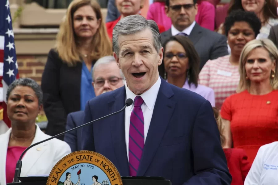 North Carolina Governor Roy Cooper speaks outside of the executive mansion in Raleigh before signing a Medicaid expansion into law on March 27, 2023. The law was a decade in the making. (Hannah Schoenbaum/AP)