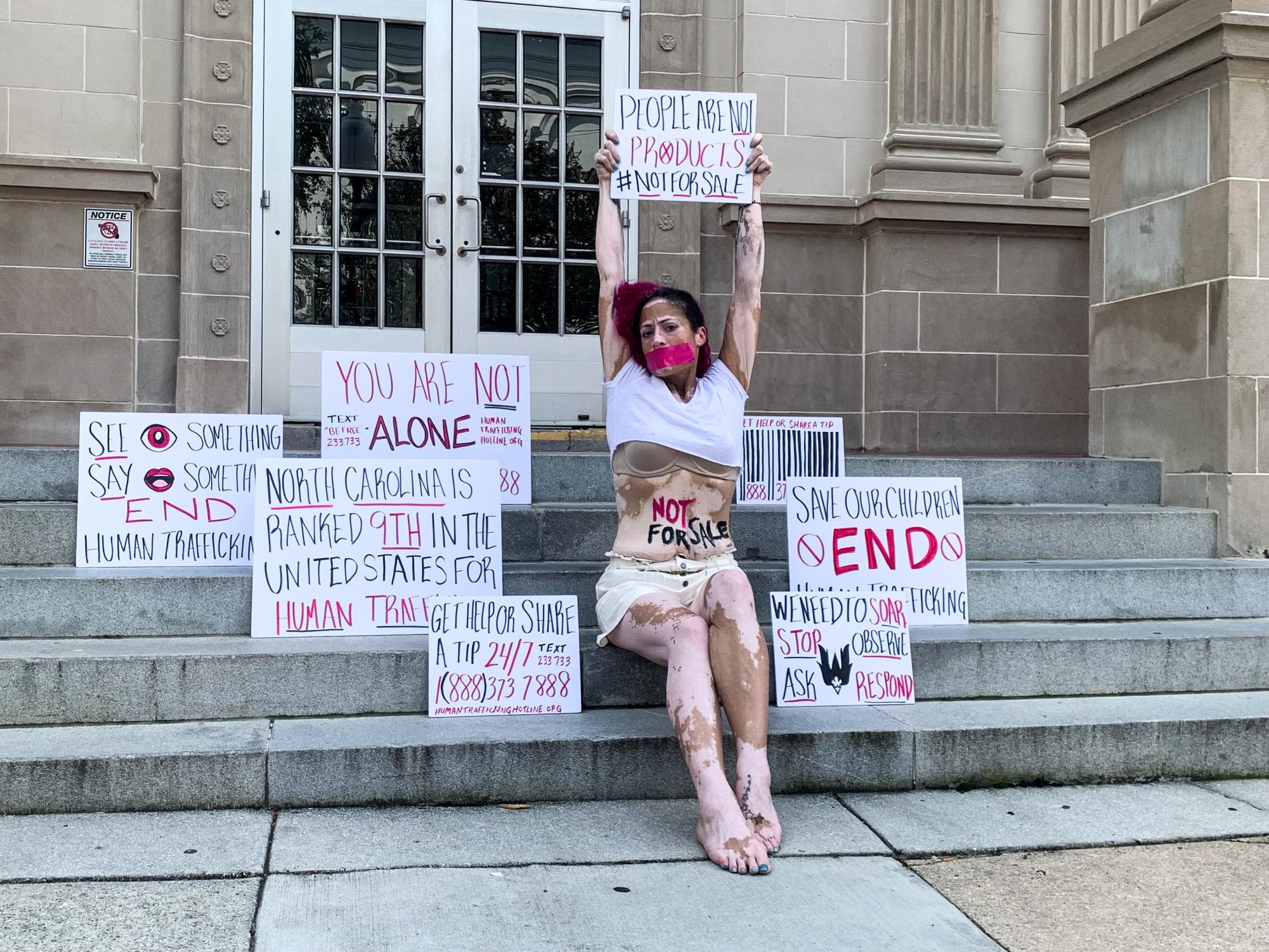 Human trafficking activists on the steps of the New Hanover County Courthouse on Aug. 27, 2023.