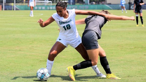 Ayla Vaneus strips the ball from VCU during UNCW Women's Soccer's opening game on August 30, 2023. ( Tom Hanna/UNCWSports.com)