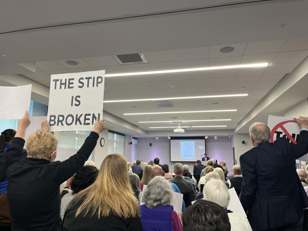  Protestors oppose tolls at the WMPO Board Meeting. (Jackson Davenport/The Seahawk)