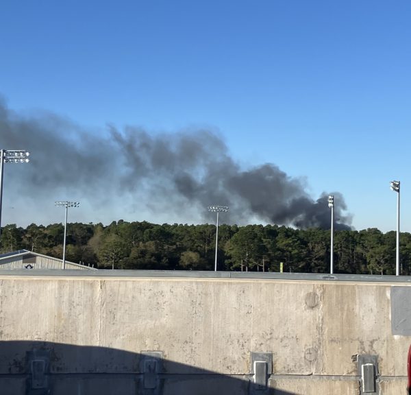 Smoke rises from Village Green, as seen from the Central Deck parking garage. (Amelia McNeese/The Seahawk)