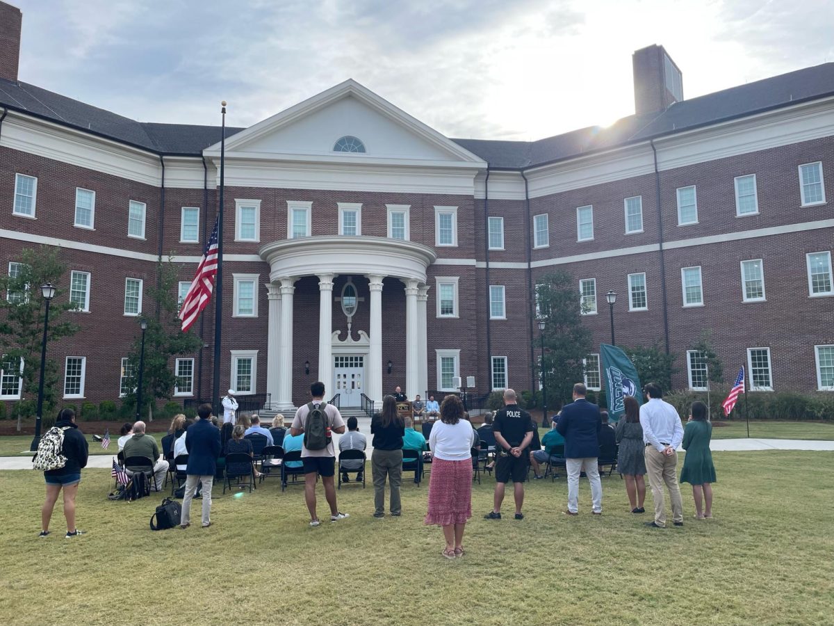 UNCW students and staff gather to honor the lives lost during the 9/11 terrorist attacks. (Photo: Maloah McCarron)