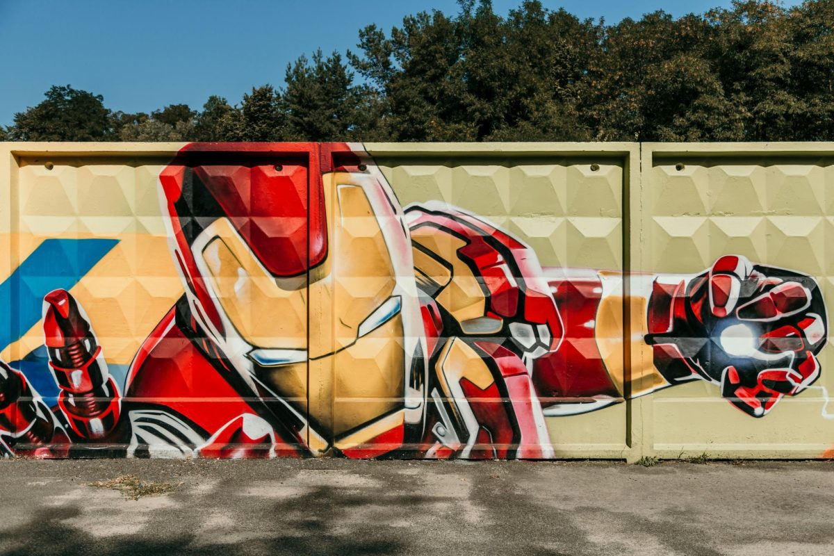 A mural of the Marvel character Iron Man painted on the side of a cargo shipping container (Marjan Blan/Unsplash). 