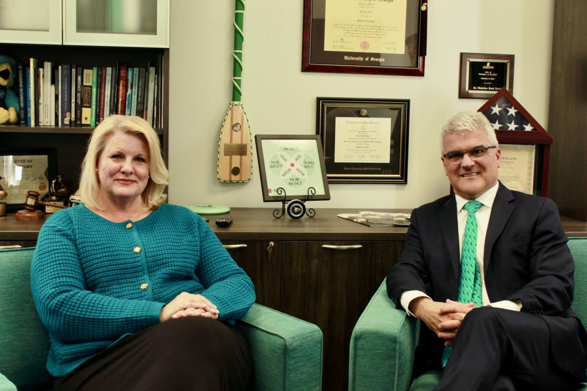 Vice Chancellor for Student Affairs Dr. Christine Reed Davis (left) and former Provost Dr. James J. Winebrake (right) sitting in the Vice Chancellor's office (Samantha Hill/The Seahawk). 