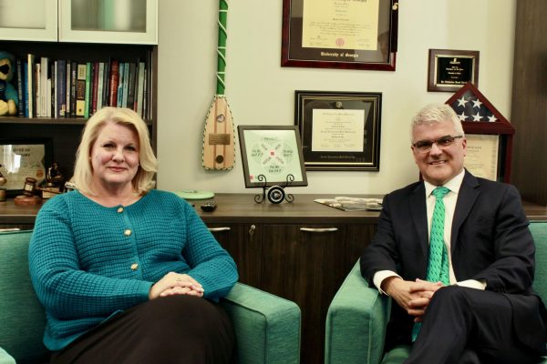 Vice Chancellor for Student Affairs Dr. Christine Reed Davis (left) and former Provost Dr. James J. Winebrake (right) sitting in the Vice Chancellor's office (Samantha Hill/The Seahawk). 