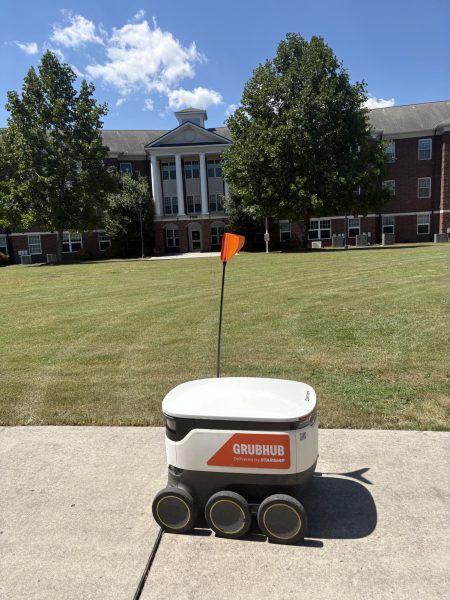 Starship robot leaving Seahawk Crossing after making a delivery (Addison Lowry/The Seahawk).