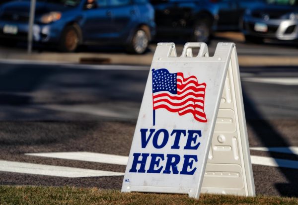 A "Vote Here" sign outside of a polling location in Woodbury, M.N. for the 2020 general election (Tony Webster/Flickr.com CC BY 2.0).