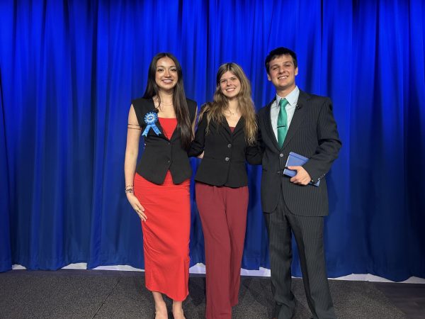 Left to right: Russia Naranjo, Zoe Phillips and Jansen Huff, the candidates for Student Body President, come together for their debate (Peyton Lewis/The Seahawk).